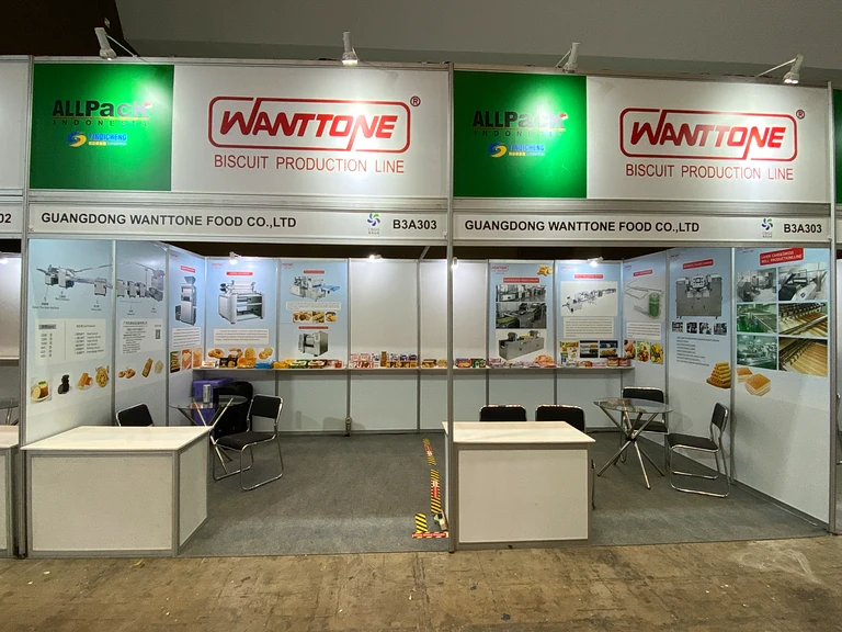 Wanttone booth at ALLPack Indonesia with machinery information and packaged biscuits